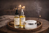 Candle-lit wellness ritual with essential oils, body lotion, and incense
