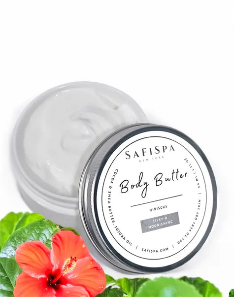 Close-up of SaFiSpa Body Butter creamy texture applied to skin, showcasing its rich, non-greasy moisturizing formula
