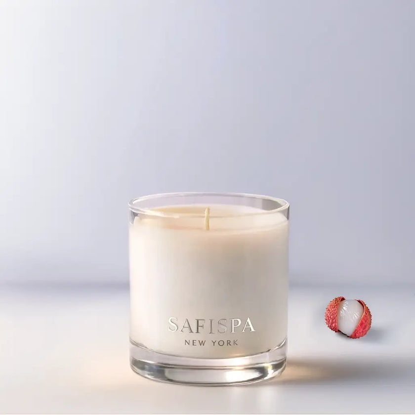 Safispa New York Fresh Lychee & White Tea luxury soy candle in clear glass jar, bright fruity floral home fragrance with refined modern design.