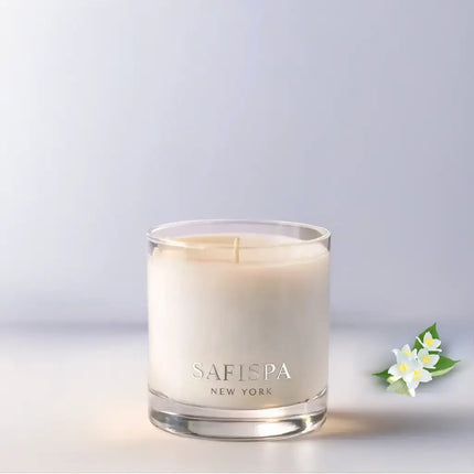 Safispa New York Jasmine Petals & Ripe Peach luxury soy candle in clear glass jar, floral fruity home fragrance with elegant silver branding.