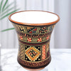 Ceramic candle vase with geometric patterns on a white background