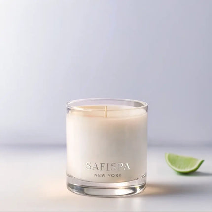 Safispa New York Tropical Citrus, Lime & Amber luxury soy candle in clear glass vessel, vibrant citrus home fragrance with warm amber undertones.