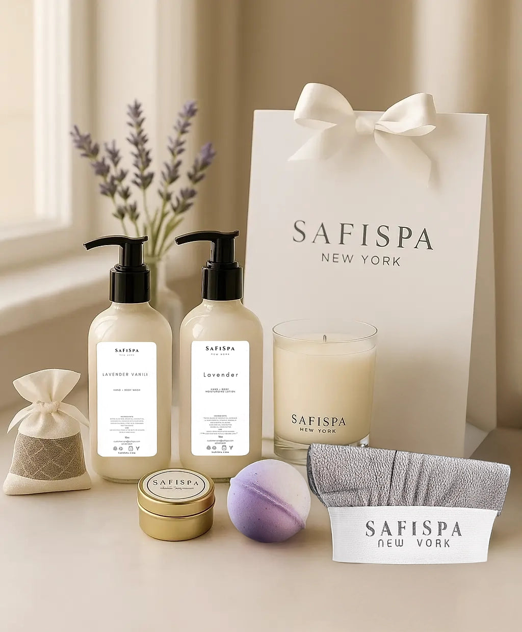 Bath & Body Gifty Set. Indulge in serenity with the SafiSpa Tranquil Luxe Lavender Vanilla Spa Set. Includes relaxing candle, nourishing lotion, invigorating body wash, and more. Perfect for a spa-like experience at home.
