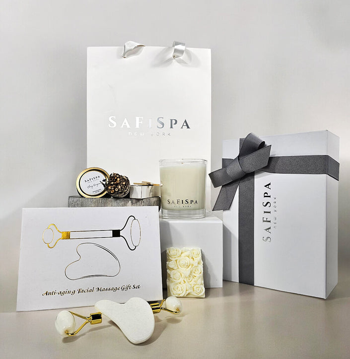 Unwind in serenity with the SafiSpa Harmony Gift Set. Includes sage cleanse stick, gua sha set, amethyst elephant, mini candle, and your choice of full-size soy candle.