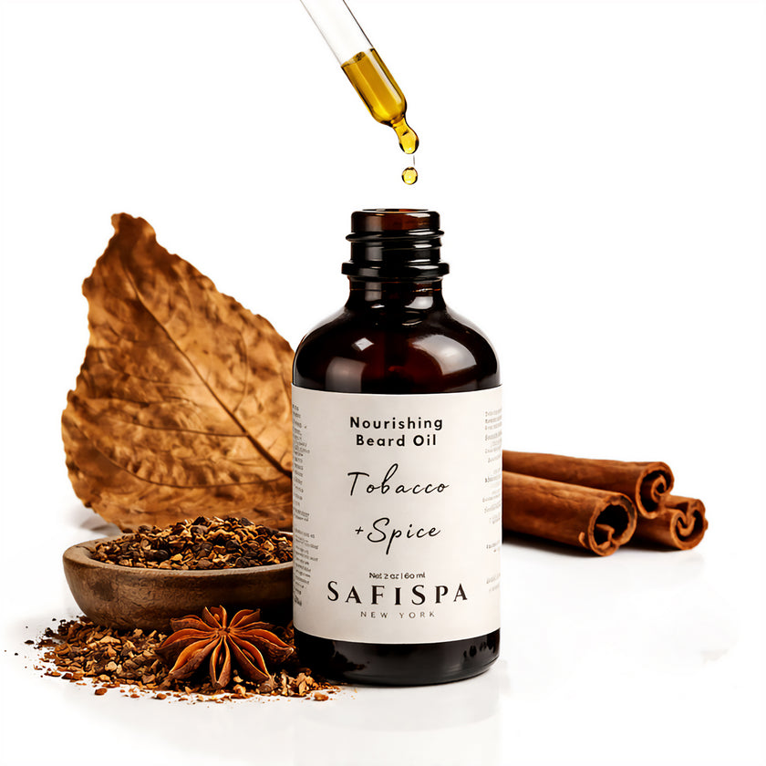 Close up of SAFISPA nourishing beard oil dropper with golden oil for beard hydration and shine