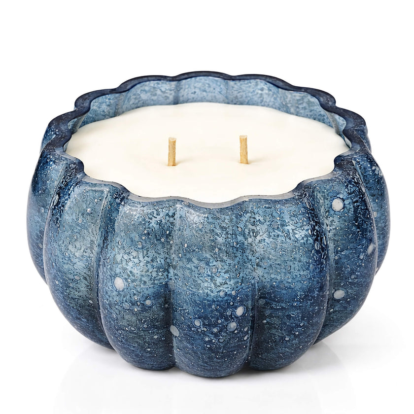 A handcrafted blue sculptural candle vessel from SaFiSpa’s bespoke collection, featuring a unique artisan ceramic design and dual wick for a refined luxury experience.