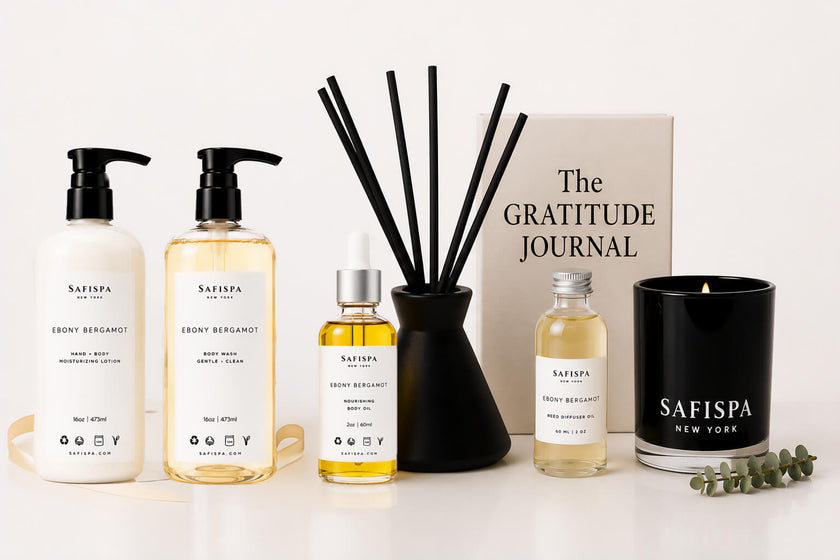 SaFiSpa Ebony Bergamot luxury home fragrance and body care gift set featuring soy candle, moisturizing lotion, body wash, nourishing body oil, reed diffuser oil and elegant aromatherapy accessories handcrafted in New York.