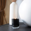 Relaxing moment with the soft light and captivating aroma of Safispa's Ebony Bergamot candle