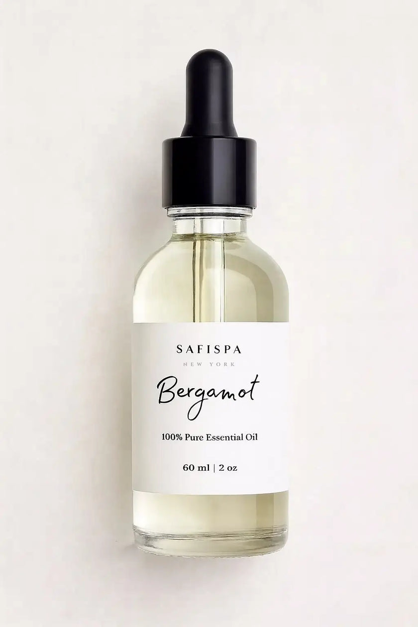 Bottle of Safispa Bergamot essential oil on a light background