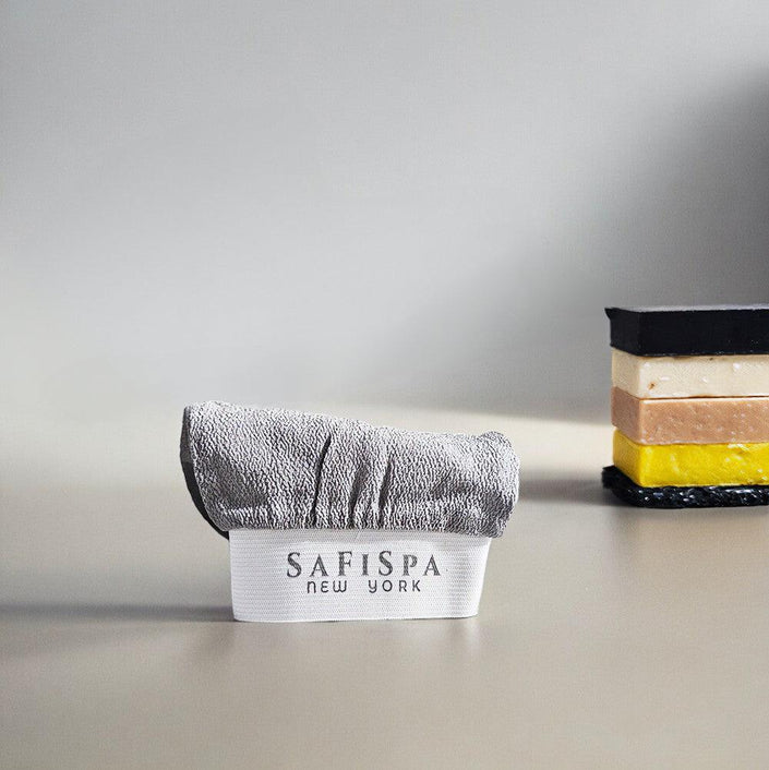 SafiSpa Exfoliating Glove gently buffs away dead skin cells for soft, radiant skin.