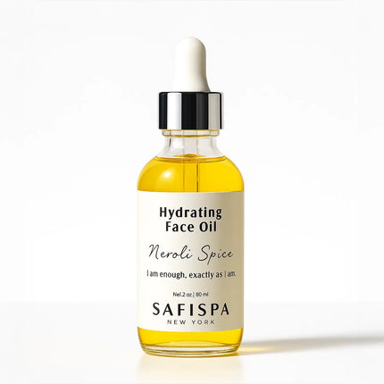 SaFiSpa Hydrating Face Oil – Neroli Spice on glossy white; clean, vegan, non-comedogenic glow oil