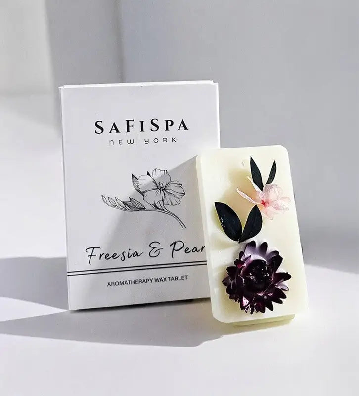 Shop Freesia & Pear Wax Tablets: Crafted with natural soy wax and infused with the uplifting scents of freesia and pear.