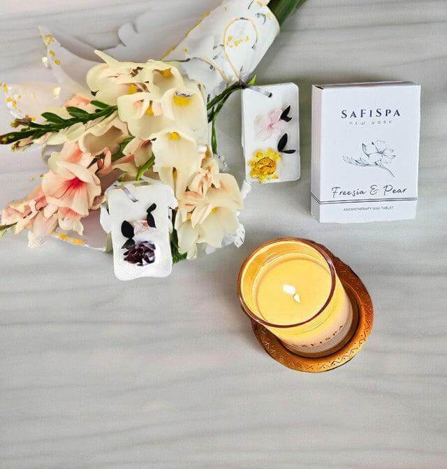 Uplift your mood and unwind with Safispa's Freesia & Pear Wax Tablets. Natural soy wax infused with relaxing essential oils.