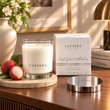 SaFiSpa Fresh Lychee & White Tea candle with luxury gift box and silver lid in an elegant home setting