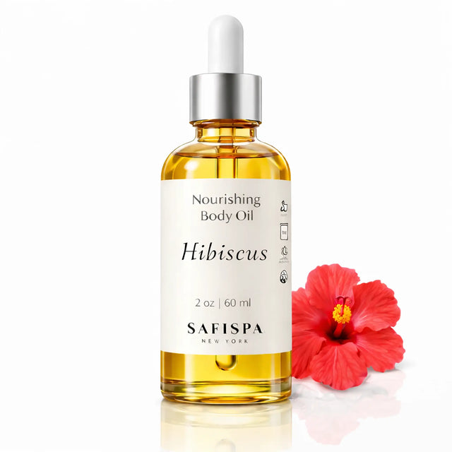 SaFiSpa Hibiscus Nourishing Body Oil 2 oz glass bottle on white background with silver dropper and luxury skincare packaging