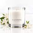 jasmine wax candle in a clear glass jar by SAFISPA NEW YORK printed on the front, shop stylist soy scented candle 