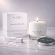 Safispa New York lavender vanilla candle with packaging on a gray surface