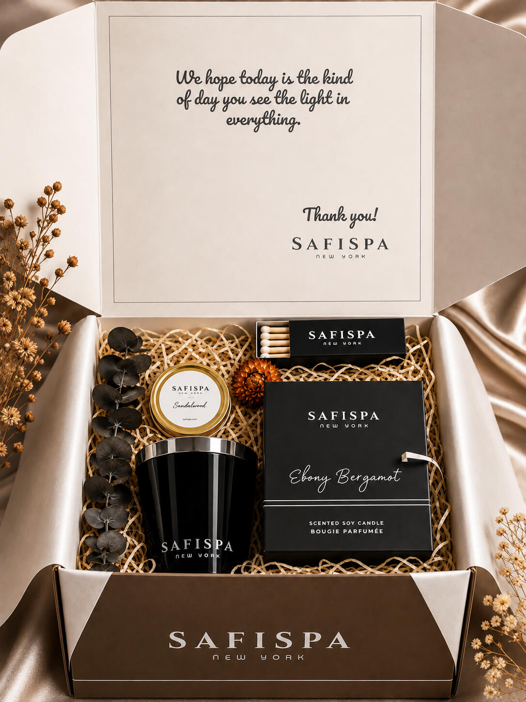 SaFiSpa luxury candle gift set with Ebony Bergamot scented soy candle, silver lid, matches and dried flowers in signature gift box