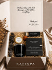 SaFiSpa luxury candle gift set with Ebony Bergamot scented soy candle, silver lid, matches and dried flowers in signature gift box