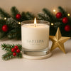 SaFiSpa luxury Christmas candle in glass jar with festive pine, red berries, and golden star holiday décor