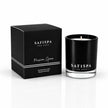 Safispa Passion Spice scented soy candle in a black glass jar next to its black packaging box, clean luxury candle