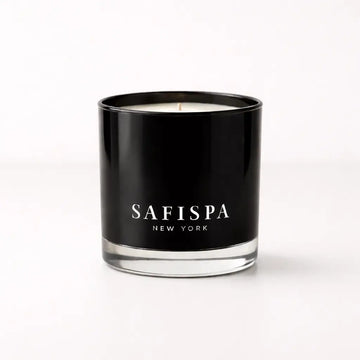 Luxury passion fruit candle in black glass jar, bright tropical fragrance with juicy citrus and exotic fruit notes, clean-burning soy wax for a vibrant summer home ambiance.