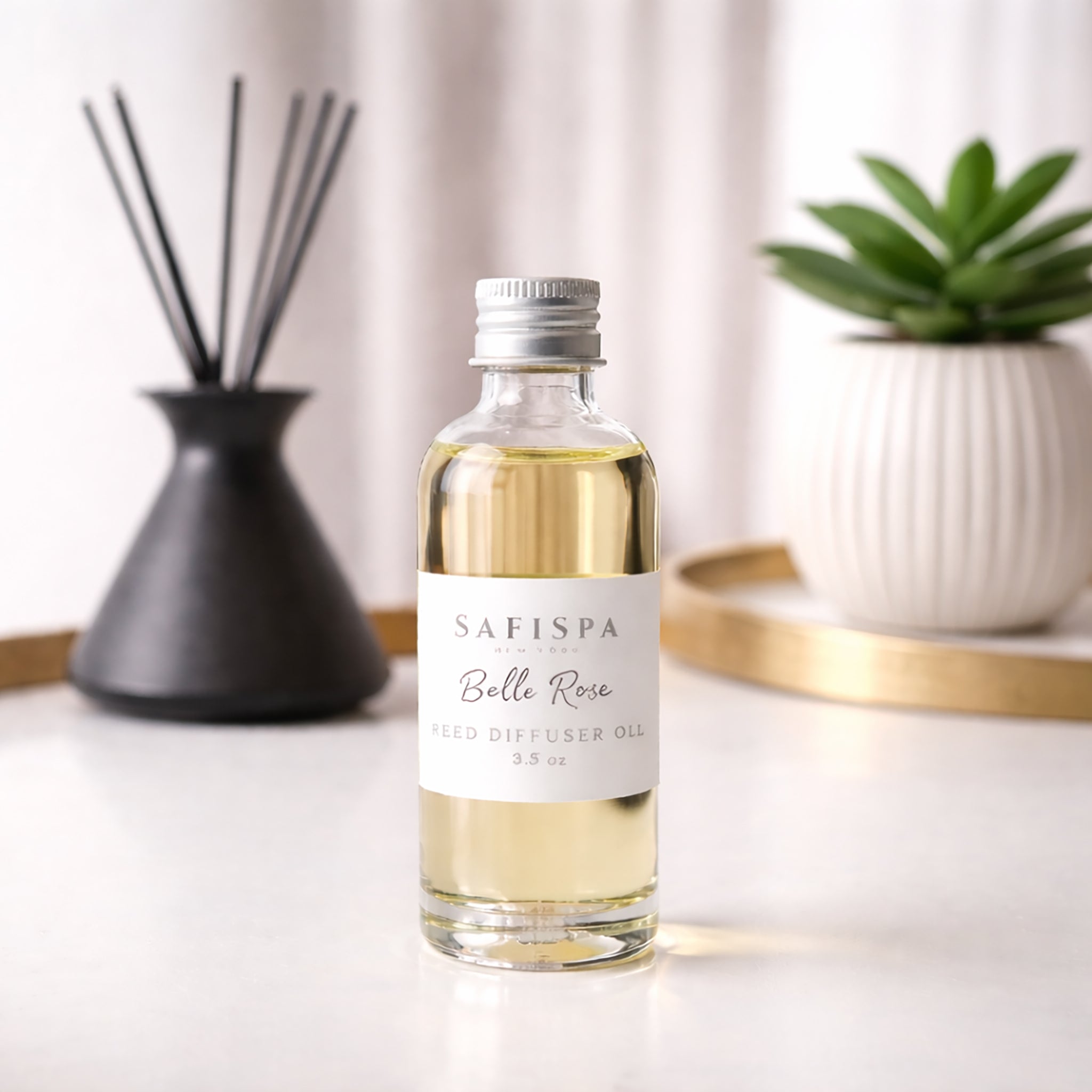 SaFiSpa Belle Rose reed diffuser oil in use with long lasting fragrance in a modern luxury home decor setting for aromatherapy and home scent