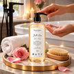 best rose body wash Hand pressing pump of SaFiSpa Belle Rose luxury hand and body wash during spa skincare ritual