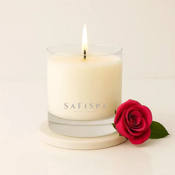 Belle rose scented candle in a glass jar with dried rose petals, perfect for romantic decor. shop now