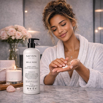 woman applying SAFISPA Belle Rose moisturizing lotion for soft hydrated glowing skin