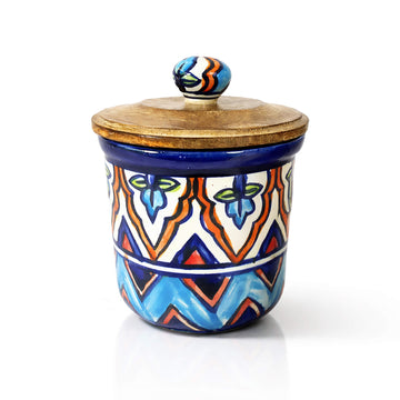 Handcrafted luxury ceramic candle vessel with intricate blue and orange patterns, part of SaFiSpa bespoke candle collection, designed for premium home fragrance and elegant decor