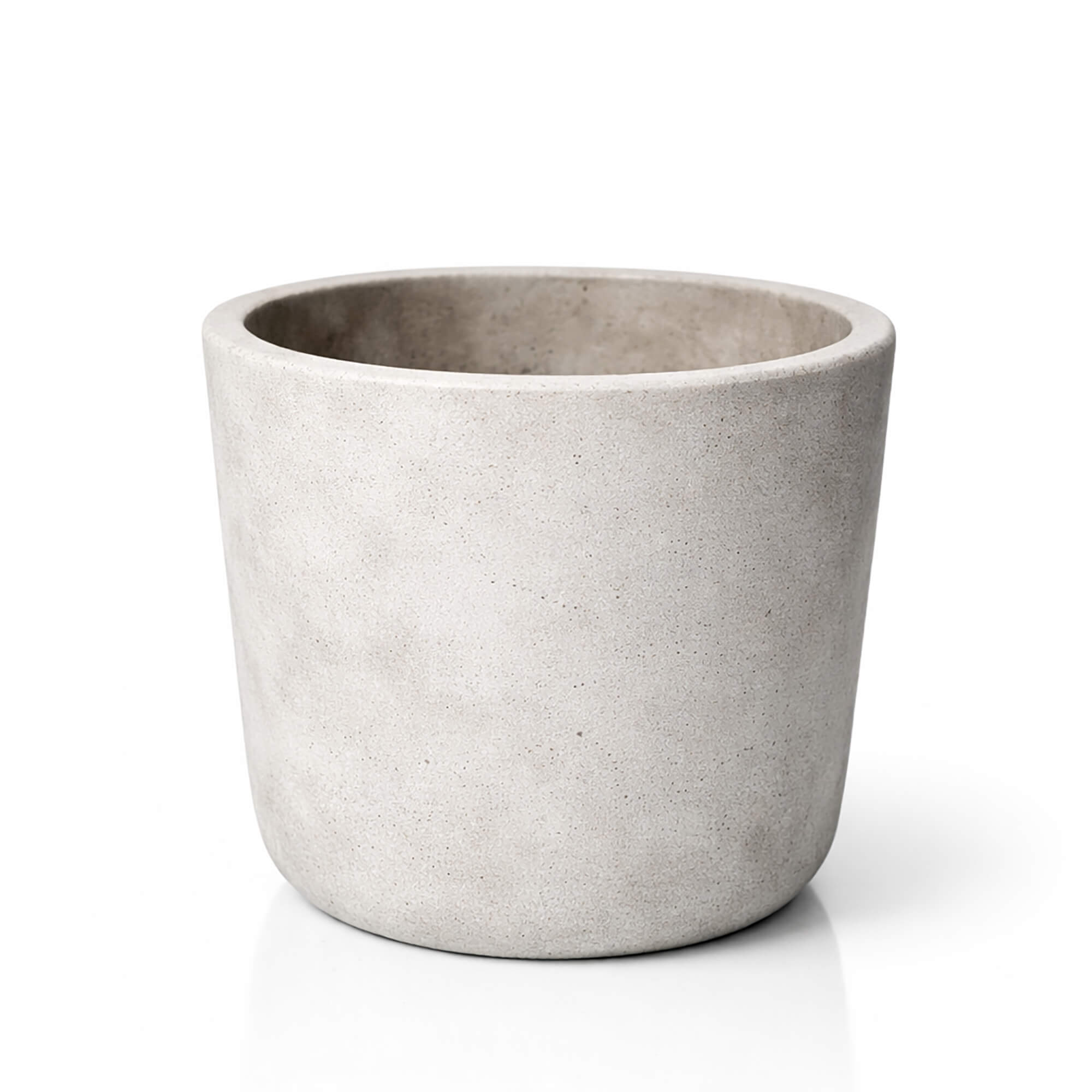 Handcrafted minimalist concrete candle vessel with smooth neutral ceramic finish from SaFiSpa bespoke collection designed for modern luxury home decor and refined interiors