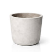 Handcrafted minimalist concrete candle vessel with smooth neutral ceramic finish from SaFiSpa bespoke collection designed for modern luxury home decor and refined interiors