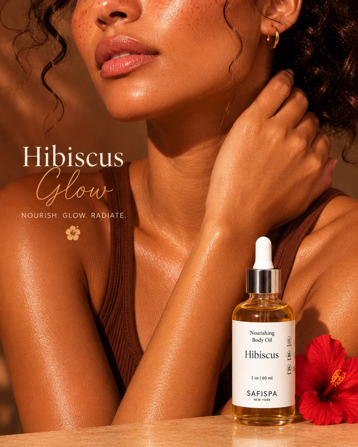  beauty campaign image featuring glowing smooth skin with SaFiSpa Hibiscus Glow Body Oil, lightweight botanical body oil for radiant-looking skin, luxury self-care, and silky hydration.