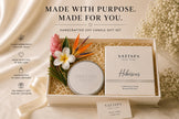 Luxury SaFiSpa New York Hibiscus scented soy candle gift set featuring premium white packaging, silver candle lid, tropical floral arrangement, handcrafted wellness presentation, and elegant home fragrance styling for luxury gifting and spa-inspired décor