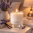 SaFiSpa Vanilla Essence candle glowing in luxury living room creating warm relaxing vanilla home fragrance.