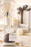 SaFiSpa Lavender Vanilla luxury home fragrance gift set featuring a handcrafted soy candle, premium reed diffuser, aromatic lavender sachet, and elegant gift box for relaxation and thoughtful giftin