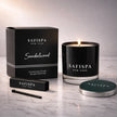Luxury sandalwood candle in black glass vessel, clean-burning soy wax with warm woody fragrance