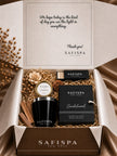 SaFiSpa Sandalwood candle luxury gift set with scented soy candle, silver lid, matches and sandalwood-inspired botanical packaging.