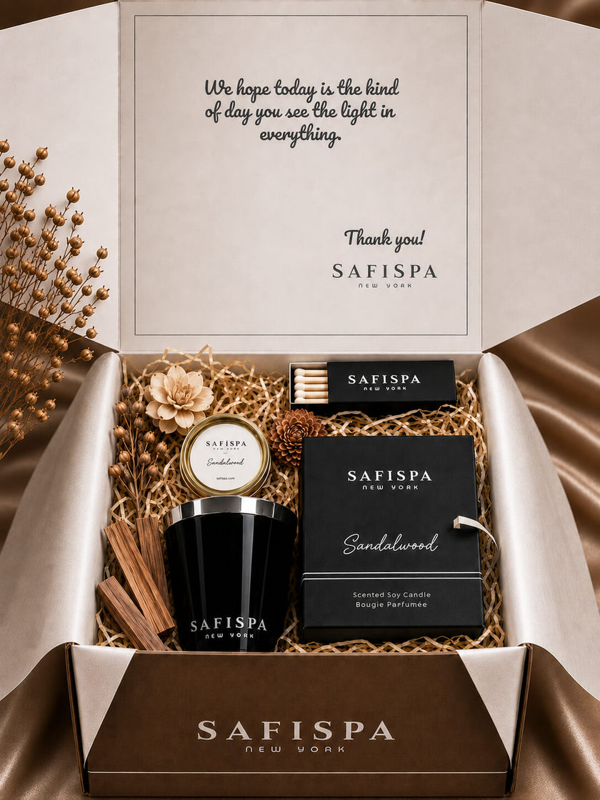 SaFiSpa Sandalwood candle luxury gift set with scented soy candle, silver lid, matches and sandalwood-inspired botanical packaging.