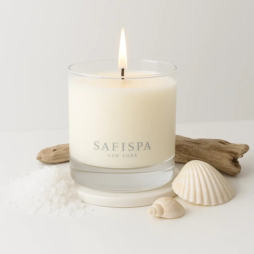 Sea Salt scented candle with oceanic notes, evoking a fresh coastal breeze. Shown in a textured ceramic jar for a modern beachy look.