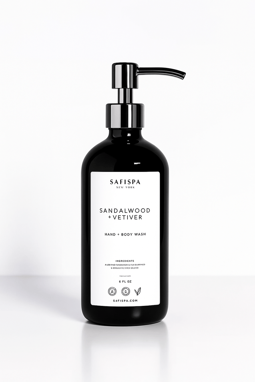 Sandalwood + Vetiver Hand and Body Moisturizing Body Wash in black pump bottles with stainless steel tops, set against a golden marble background for an elegant presentation.