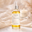 SaFiSpa Unscented Body Oil luxury spa bathroom setting with marble counter and minimalist skincare aesthetic